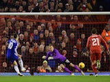 Eden Hazard of Chelsea scores the opening goal past Simon Mignolet of Liverpool from the penalty spot during the Capital One Cup Semi-Final first leg match on January 20, 2015