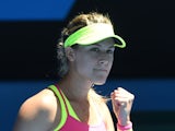 Canada's Eugenie Bouchard celebrates after victory in her women's singles match against France's Caroline Garcia on day five of the 2015 Australian Open tennis tournament in Melbourne on January 23, 2015