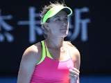 Eugenie Bouchard of Canada celebrates winning in her fourth round match against Irina-Camelia Begu of Romania during day seven of the 2015 Australian Open at Melbourne Park on January 25, 2015