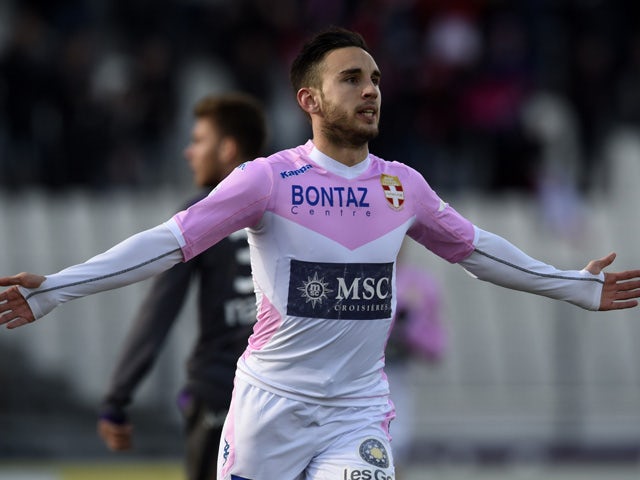 Evian's French forward Adrien Thomasson reacts after scoring by during the French L1 football match Evian Thonon Gaillard against Toulouse FC on January 25, 2015