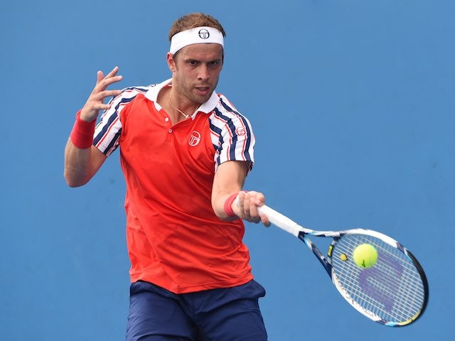 Gilles Muller in action on day four of the Australian Open on January 22, 2015