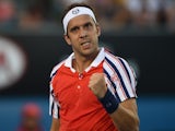 Luxembourg's Gilles Muller celebrates a point in his men's singles match against John Isner of the US on day six of the 2015 Australian Open tennis tournament in Melbourne on January 24, 2015