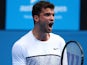 Grigor Dimitrov celebrates at the end of his second-round match on day three of the Australian Open on January 21, 2015