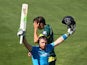 Ian Bell of England celebrates after reaching his century during the One Day International Tri Series match between Australia and England at Blundstone Arena on January 23, 2015