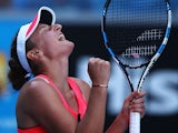Irina-Camelia Begu celebrates after knocking out Angelique Kerber in the first round of the Australian Open on January 19, 2015