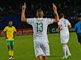 Algeria's forward Islam Slimani celebrates after scoring a goal during the 2015 African Cup of Nations group C football match between Algeria and South Africa in Mongomo on January 19, 2015