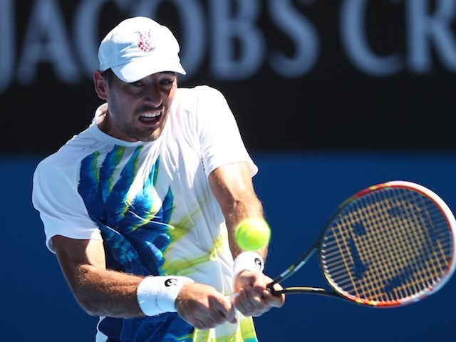 Ivan Dodig in action on day four of the Australian Open on January 22, 2015