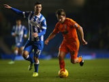 Jay Tabb of Ipswich Town is chased by Danny Holla of Brighton and Hove Albion during the Sky Bet Championship match on January 21, 2015