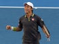Japan's Kei Nishikori celebrates after victory in his men's singles match against Steve Johnson of the US on day six of the 2015 Australian Open tennis tournament in Melbourne on January 24, 2015