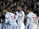 Lyon's French forward Alexandre Lacazette celebrates after scoring during the French L1 football match Olympique Lyonnais (OL) vs FC Metz (FCM) on January 25, 2015