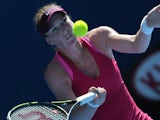 Madison Brengle of the US plays a shot during her women's singles match against Coco Vandeweghe of the US on day six of the 2015 Australian Open tennis tournament in Melbourne on January 24, 2015