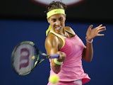 Madison Keys of the USA plays a forehand in her third round match against Petra Kvitova of the Czech Republic during day six of the 2015 Australian Open on January 24, 2015