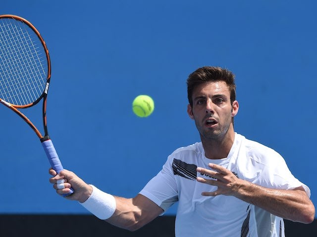 Marcel Granollers in action on day four of the Australian Open on January 22, 2015