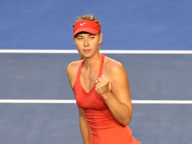 Maria Sharapova of Russia celebrates beating Zarina Diyas of Kazakhstan in their women's singles match on day five of the 2015 Australian Open tennis tournament in Melbourne on January 23, 2015