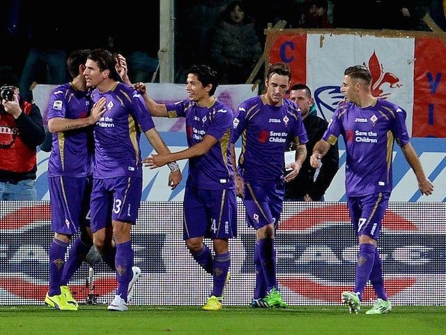 Fiorentina's German forward Mario Gomez celebrates after scoring during the Serie A football match Fiorentina vs AS Roma at Artemio Franchi stadium in Florence on January 25, 2015