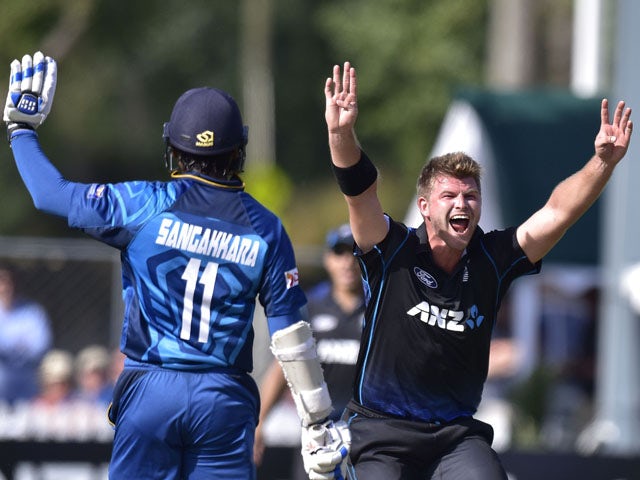 New Zealand's Corey Anderson appeals for a LBW call on Sri Lanka's Thisara Perera as Sri Lanka's Kumar Sangakkara signals to his teammate during the sixth one-day international cricket match between New Zealand and Sri Lanka at the University Oval in Dune