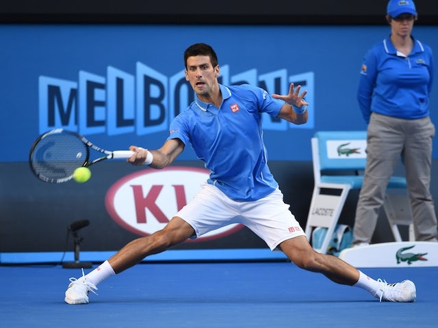 Serbia's Novak Djokovic plays a shot during his men's singles match against Spain's Fernando Verdasco on day six of the 2015 Australian Open tennis tournament in Melbourne on January 24, 2015