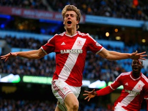 Middlesbrough go top with Wigan victory