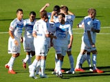 The Victory celebrate after scoring a goal during the round 16 A-League match between Perth Glory and Melbourne Victory at nib Stadium on January 25, 2015