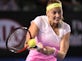 Kvitova eases past Jankovic