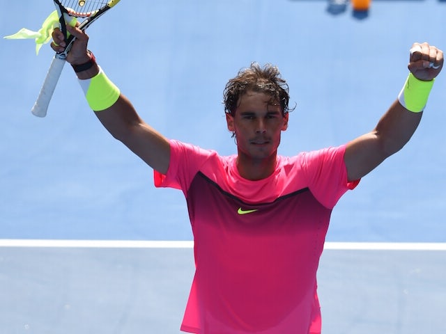 Rafael Nadal cheers after winning on day one of the Australian Open on January 19, 2015