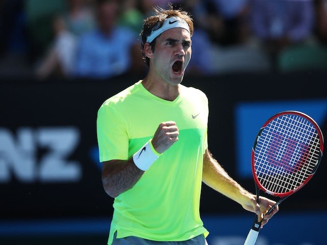 Roger Federer celebrates on day three of the Australian Open on January 21, 2015