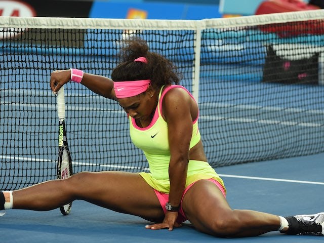 Serena Williams doing the splits after a fall on day two of the Australian Open on January 20, 2015