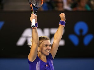 Halep recovers from slow start