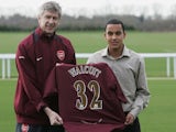 Arsenal Manager Arsene Wenger and new signing Theo Walcott, 16, pose for the media at the Arsenal training ground on January 20, 2006