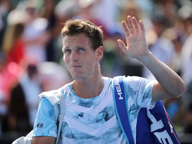 Tomas Berdych waves to the crowd after winning his first-round match at the Australian Open on January 19, 2015