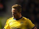 Adam Forshaw of Wigan during the Sky Bet Championship match between Brighton & Hove Albion and Wigan Athletic at Amex Stadium on November 4, 2014
