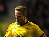 Adam Forshaw of Wigan during the Sky Bet Championship match between Brighton & Hove Albion and Wigan Athletic at Amex Stadium on November 4, 2014