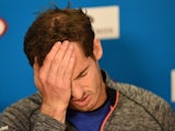 Britain's Andy Murray gestures as he addresses a press conference after defeat in his men's singles final match against Serbia's Novak Djokovic on day fourteen of the 2015 Australian Open on February 1, 2015