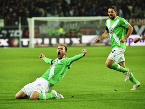 Unbeaten Bayern battered at Wolfsburg