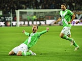Bas Dost of Wolfsburg celebrate scoring his second goal during the Bundesliga match between VfL Wolfsburg and FC Bayern Muenchen at Volkswagen Arena on January 30, 2015