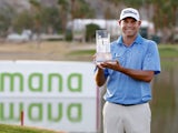 Bill Haas of the United States poses with the trophy after winning the final round of the Humana Challenge in partnership with The Clinton Foundation on the Arnold Palmer Private Course at PGA West on January 25, 2015