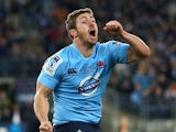 Brendan McKibbin of the Waratahs celebrates winning the Super Rugby Grand Final match between the Waratahs and the Crusaders at ANZ Stadium on August 2, 2014