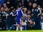 Cesc Fabregas of Chelsea high fives Jose Mourinho manager of Chelsea as he is replaced during the Capital One Cup Semi-Final second leg against Liverpool on January 27, 2015