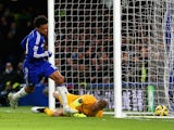 Loic Remy of Chelsea turns to celebrate after scoring the opening goal past Joe Hart of Manchester City during the Barclays Premier League match between Chelsea and Manchester City at Stamford Bridge on January 31, 2015