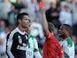 Real Madrid's Portuguese forward Cristiano Ronaldo (L) is handed a red card during the Spanish league football match Cordoba CF vs Real Madrid CF at the Nuevo Arcangel stadium on January 24, 2015