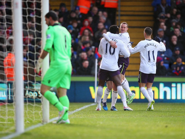 Romelu Lukaku of Everton celebrates scoring the opening goal with team mates during the Barclays Premier League match between Crystal Palace and Everton at Selhurst Park on January 31, 2015 