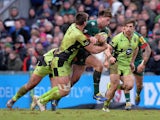 George Catchpole of Leicester Tigers is tackled by Cam Dolan of Northampton Saints during the LV= Cup match on January 31, 2015