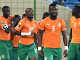 Ivory Coast's players celebrate after scoring a goal during the 2015 African Cup of Nations group D football match between Cameroon and Ivory Coast in Malabo on January 28, 2015