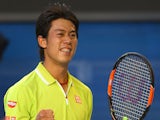 Kei Nishikori of Japan celebrates winning in his fourth round match against David Ferrer of Spain during day eight of the 2015 Australian Open at Melbourne Park on January 26, 2015
