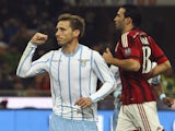 Lucas Biglia of SS Lazio celebrates after scoring the opening goal during the Serie A match between AC Milan and SS Lazio at Stadio Giuseppe Meazza on January 27, 2015 