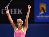 Madison Keys of the US celebrates after victory in her women's singles match against Czech Republic's Petra Kvitova on day six of the 2015 Australian Open tennis tournament in Melbourne on January 24, 2015
