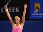 Madison Keys of the US celebrates after victory in her women's singles match against Czech Republic's Petra Kvitova on day six of the 2015 Australian Open tennis tournament in Melbourne on January 24, 2015