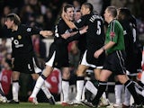  John O'Shea of Manchester United is congratulated by team mates after scoring the fourth goal for United, during the Barclays Premiership match between Arsenal and Manchester United at Highbury on February 1, 2005