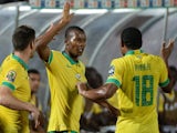 South Africa's midfielder Mandla Masango (C) celebrates with teammates after scoring a goal during the 2015 African Cup of Nations group C football match against Ghana on January 27, 2015