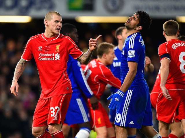 Martin Skrtel of Liverpool clashes with Diego Costa of Chelsea during the Capital One Cup Semi-Final second leg on January 27, 2015